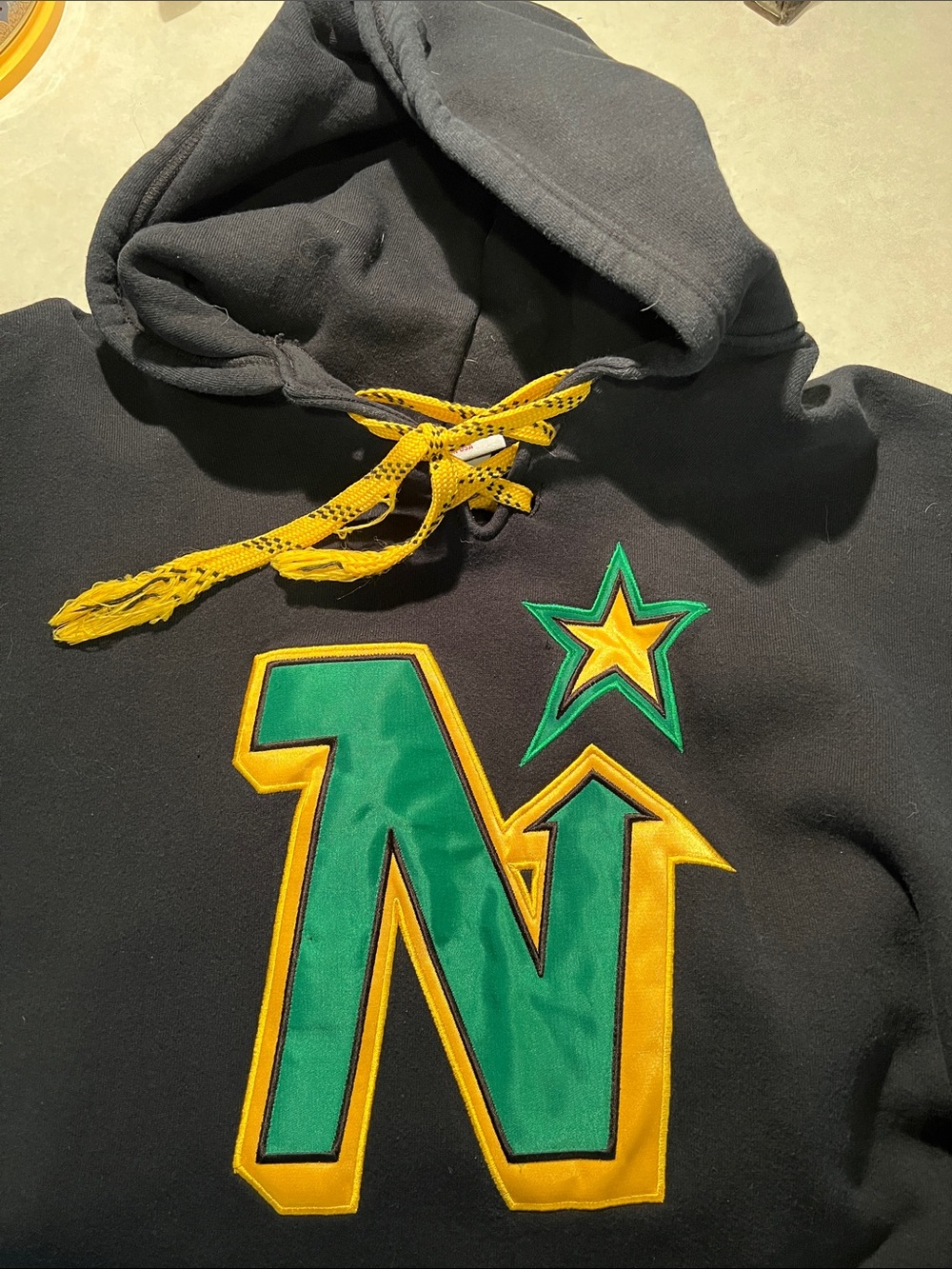 Minnesota North Stars Throwback Black Hoodie with Green & Yellow 'N' Star Patch